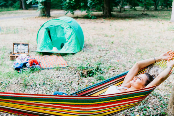 istock Young couple hiking and camping at forest 1362248917