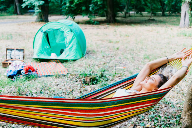 istock Young couple hiking and camping at forest 1362248919