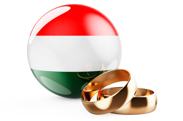 Weddings in Hungary concept. Wedding rings with Hungarian flag. 3D rendering isolated on white background