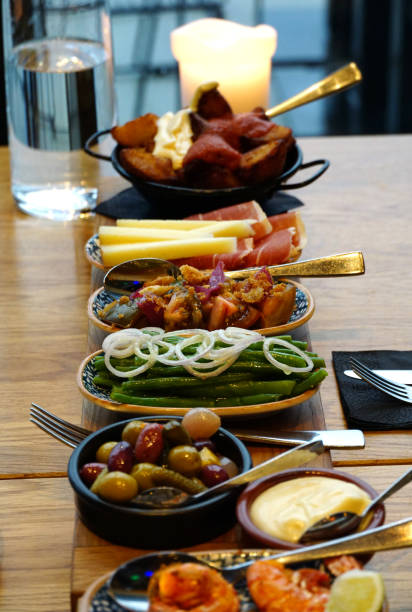 istock Delicious appetizer tapas food arranged on the table and prepared for eating 1362250551