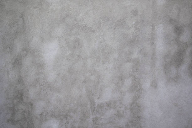 istock Concrete wall of  grey color, cement texture background . 1362253801