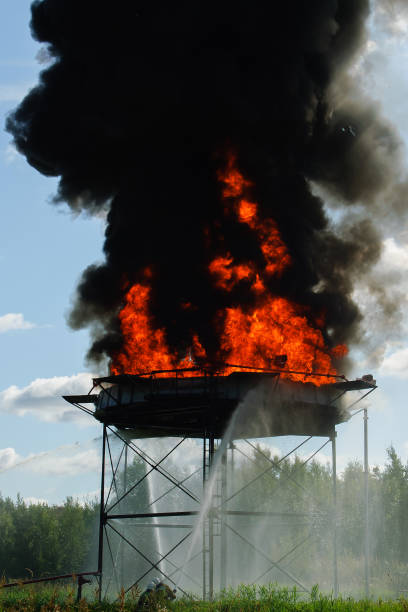 istock Firefighters extinguish a large fire at the factory. 1362255959
