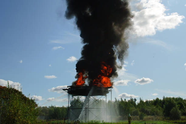 istock Firefighters extinguish a large fire at the factory. 1362256010