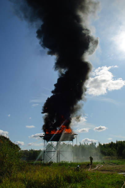 istock Firefighters extinguish a large fire at the factory. 1362256055