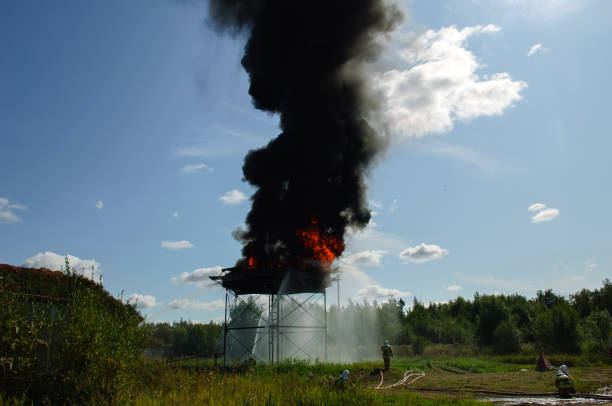 istock Firefighters extinguish a large fire at the factory. 1362256093