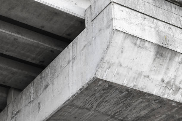 Rough concrete details of a bridge span. Abstract industrial architecture background