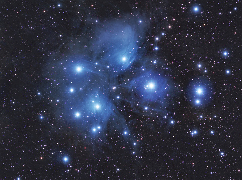 M45, The Pleiades, or The Seven Sisters, are an open star cluster located in the constellation of Taurus. It is among the nearest star clusters to Earth and is the cluster most obvious to the naked eye in the night sky. Dust that forms a faint reflection nebulosity around the brightest stars was thought at first to be left over from the formation of the cluster, but is now known to be an unrelated dust cloud in the interstellar medium, through which the starlight is passing.\n\nThis image was captured using amateur astrophotography equipment including a Skywatcher 80mm telescope, a QHY269M monochrome camera and a seven position filter wheel containging Red, Green, Blue, Hydrogen Alpha, Oxygen III and Suplphur II filters. Tracking was done using an iOptron CEM70G mount and PHD2 guiding software.  It was entirely processed using PixInsight.