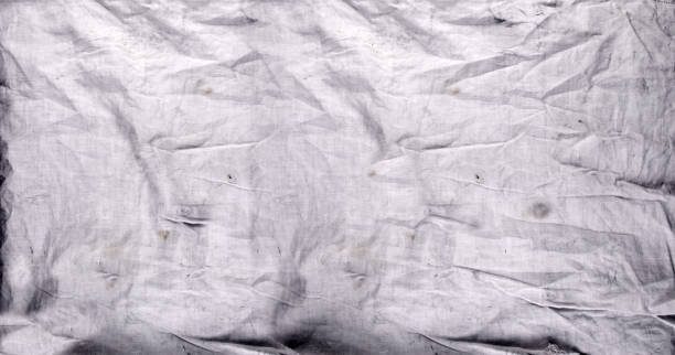 Close up dirty peace of white canvas fabric.