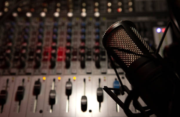 istock sound mixer and faders with condenser microphone DJ disco 1362263537
