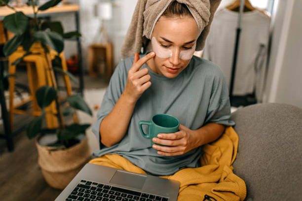 istock Woman with medical eye patch drinking coffee 1362264772