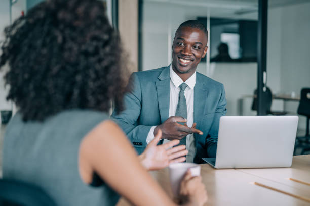 business partners in meeting. - board room discussion contract agreement imagens e fotografias de stock