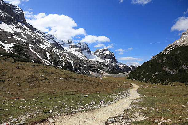 istock Alpine Landscape, Mountain Peaks Against Blue Sky 136226535