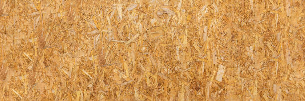 istock OSB texture. Chipboard sheet. It can be used as a background. Construction concept, fresh renovation, building materials 1362276345