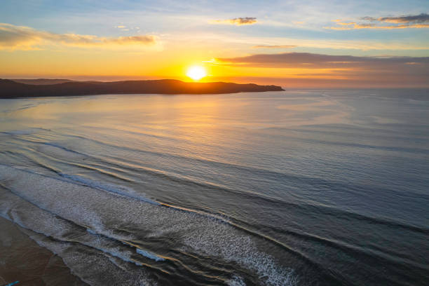 istock Sunrise seascape with a mix of high and medium clouds 1362277640