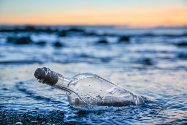 istock SOS bottle in the sea 1362281875