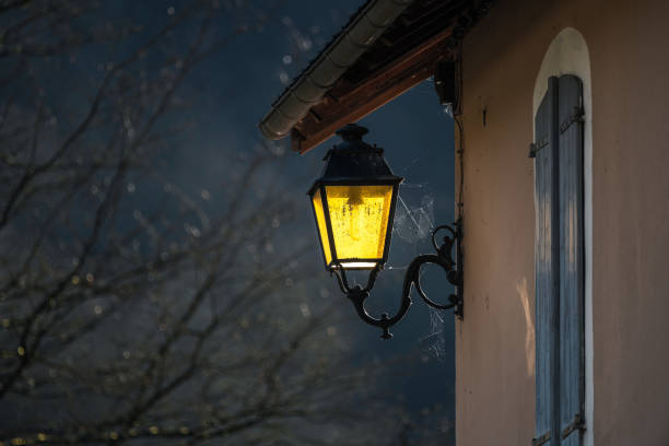 Antique cast iron street lamp in french village