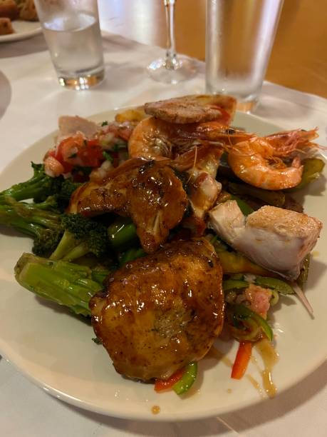 istock Big mixed seafood chicken dish close up. 1362285521
