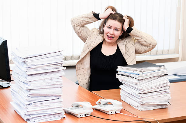 istock Tired woman in office 136228752