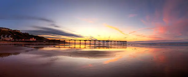 Saltburn Pier, on the North Yorkshire coast of England.  Panorama taken at sunset.