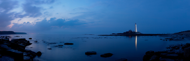 Panorama of St Mary's Lighthouse, Whitley Bay, Tyne and Wear, England at twilight.