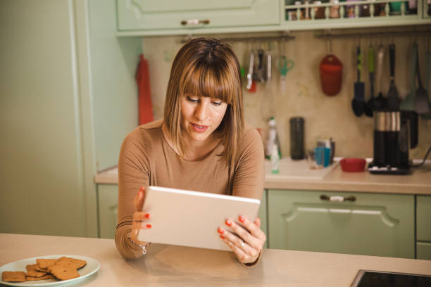 istock Woman With a Digital Tablet 1362293257