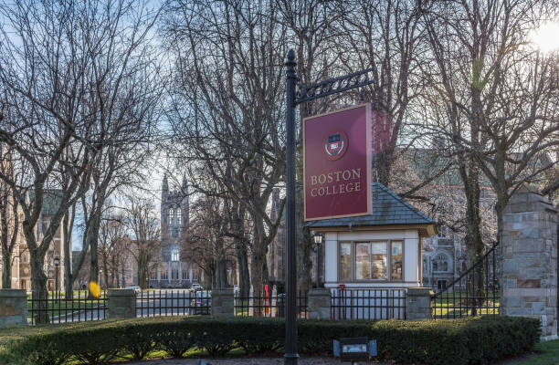 Boston College Boston, USA - December 23, 2021: View of Boston College main entrance, in Chestnut Hill, Massachusetts. boston college campus stock pictures, royalty-free photos & images