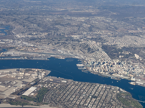 Aerial View San Diego Harbor on a clear winter day with commercial and private yachts and ships in the Bay