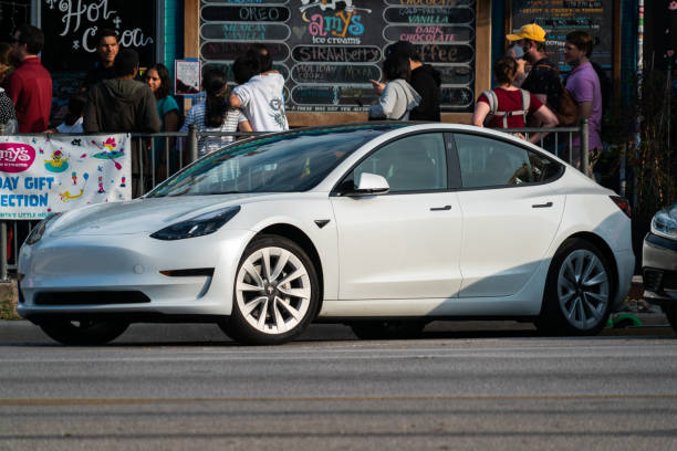Tesla Model 3 January 2nd , 2022 - Austin , Texas , USA: what Tesla Model 3 parked on South Congress avenue in downtown Austin Texas tesla model 3 stock pictures, royalty-free photos & images