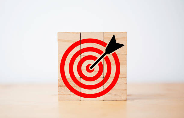 istock Red dartboard with red arrow for focus to business objective target concept. 1362297441