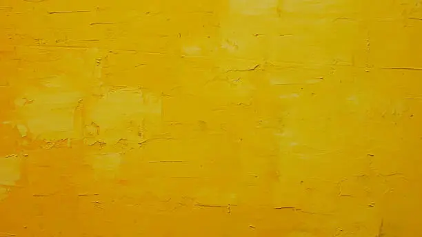 orange paint on a plywood surface, as a background or backdrop. abstract.