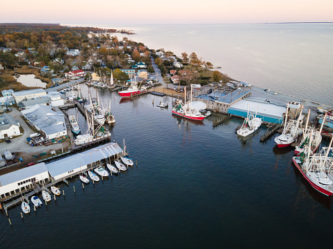 Aerial view of sailboats and fishing trawlers in the town harbor of Oriental in eastern North Carolina.