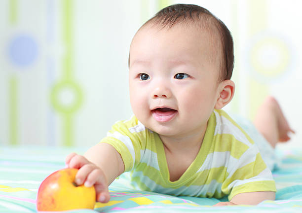 istock Cute baby on the bed 136230252