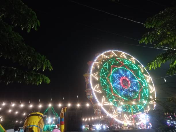 istock the lights on the windmill ride on new year's eve 1362305680
