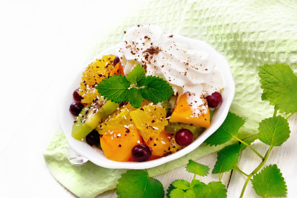 istock Salad fruit with cranberries in bowl on napkin 1362307979