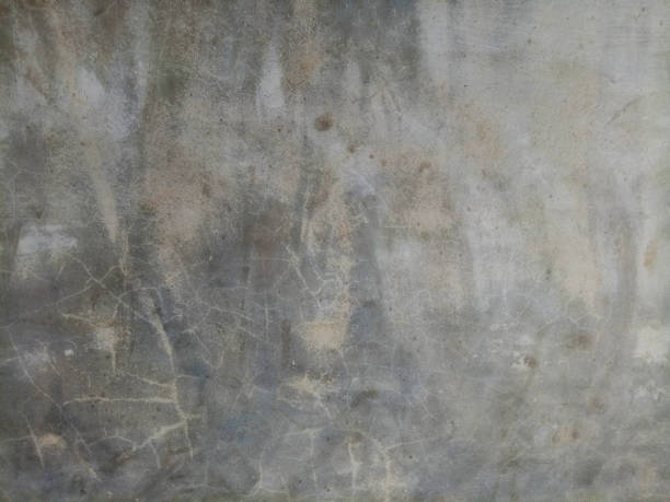 istock Old gray concrete or cement wall textured background. 1362308068