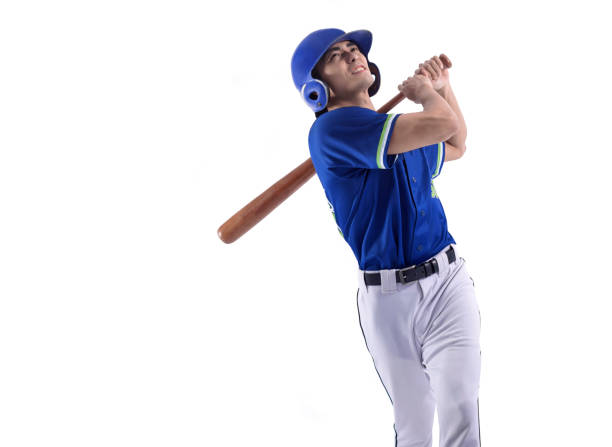 Baseball player in action and isolated on white stock photo