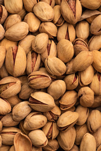 istock Many dryed salted opened pistachios 1362322911