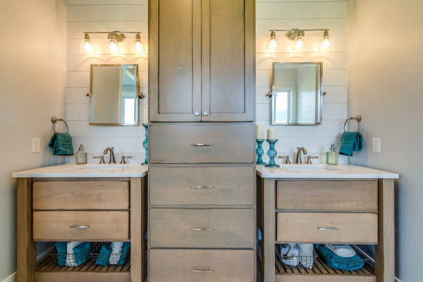 istock Double vanity with cabinets in between and a natural wood look 1362324792