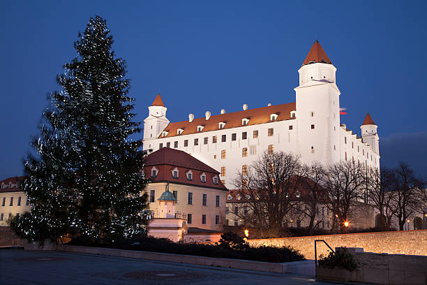 bratislava - castle from parliament at night and christmas tree