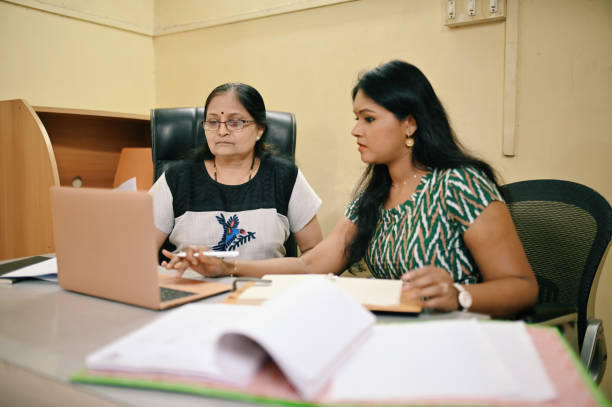 istock Women working and discussing together during a meeting in office 1362328512
