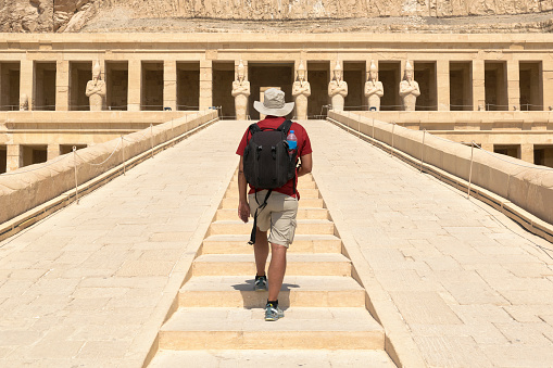 Solo traveler at temple of Hatshepsut in Luxor, Egypt