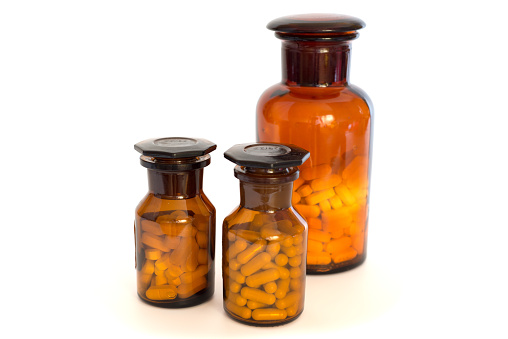 Alchemy, drugstore, pharmacy - amber glass bottles and equipment