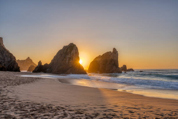 istock Beautiful sunset on a beach with sea stacks 1362335463
