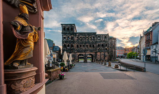 Saint Nicolas as foreground in the view of the World Heritage Site Porta Nigra in Trier