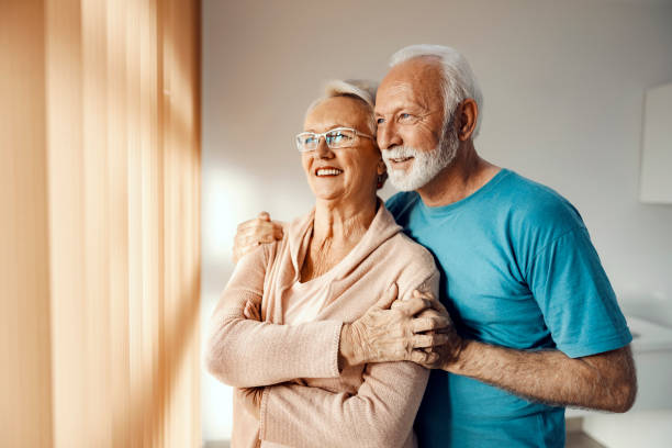 istock A happy old couple hugging in nursing home. Elder care 1362337793