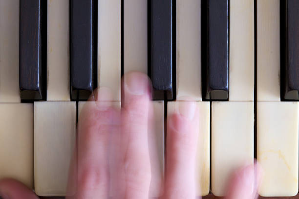 Musician play piano in daylight\u2028http://www.massimomerlini.it/is/music.jpg