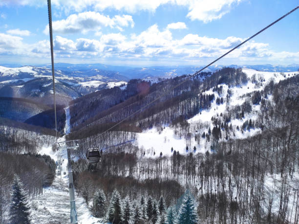 Mountain ski slope and ski lift. Winter ski holidays - concept. Phone photography themes.