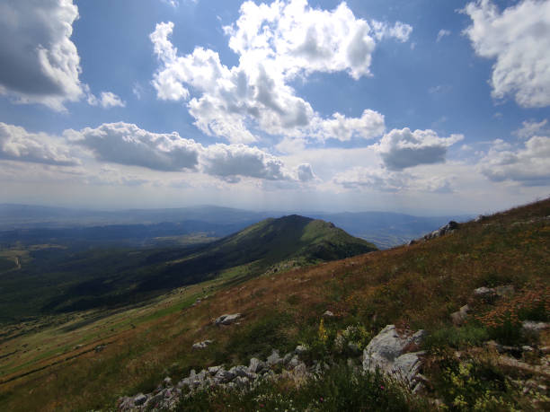 istock Beautiful mountains on a sunny cloud day 1362345923