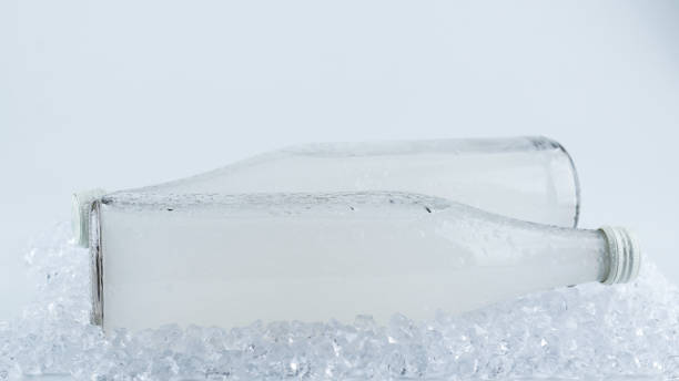 istock A white bottle with a soda drink on ice isolated. 1362347453