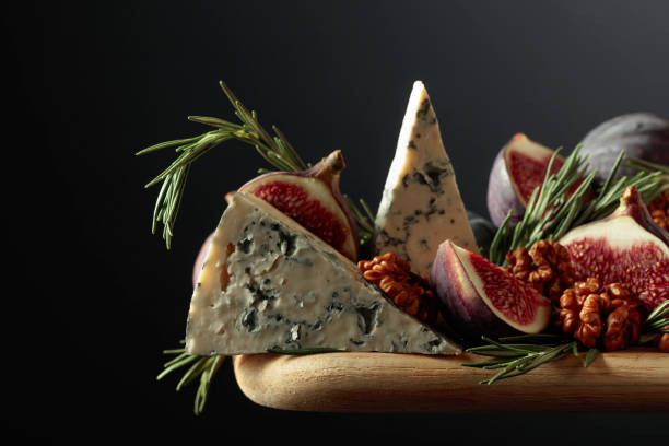 istock Blue cheese with figs, walnuts, and rosemary. 1362349865